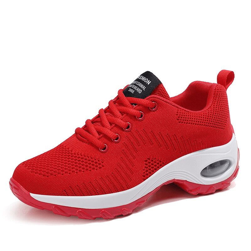 Vibrant red women's sneakers with breathable mesh upper and cushioned EVA sole, perfect for sports and daily activities.